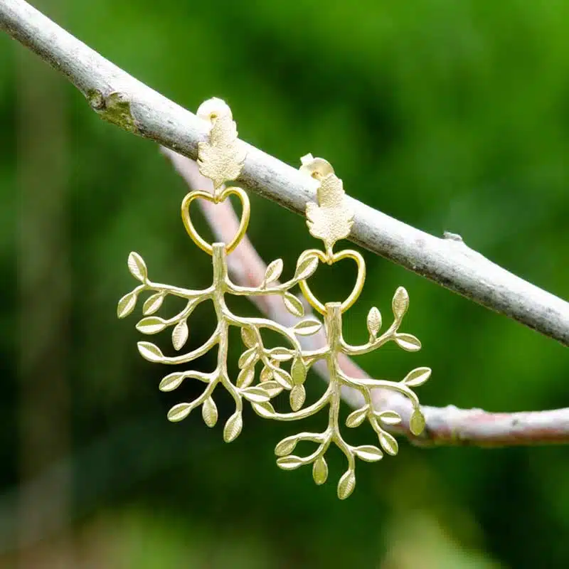 Jewellery & accessory collections gold leave earrings.